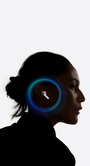 A person wearing Services Pro 3 with soundwaves around their ear